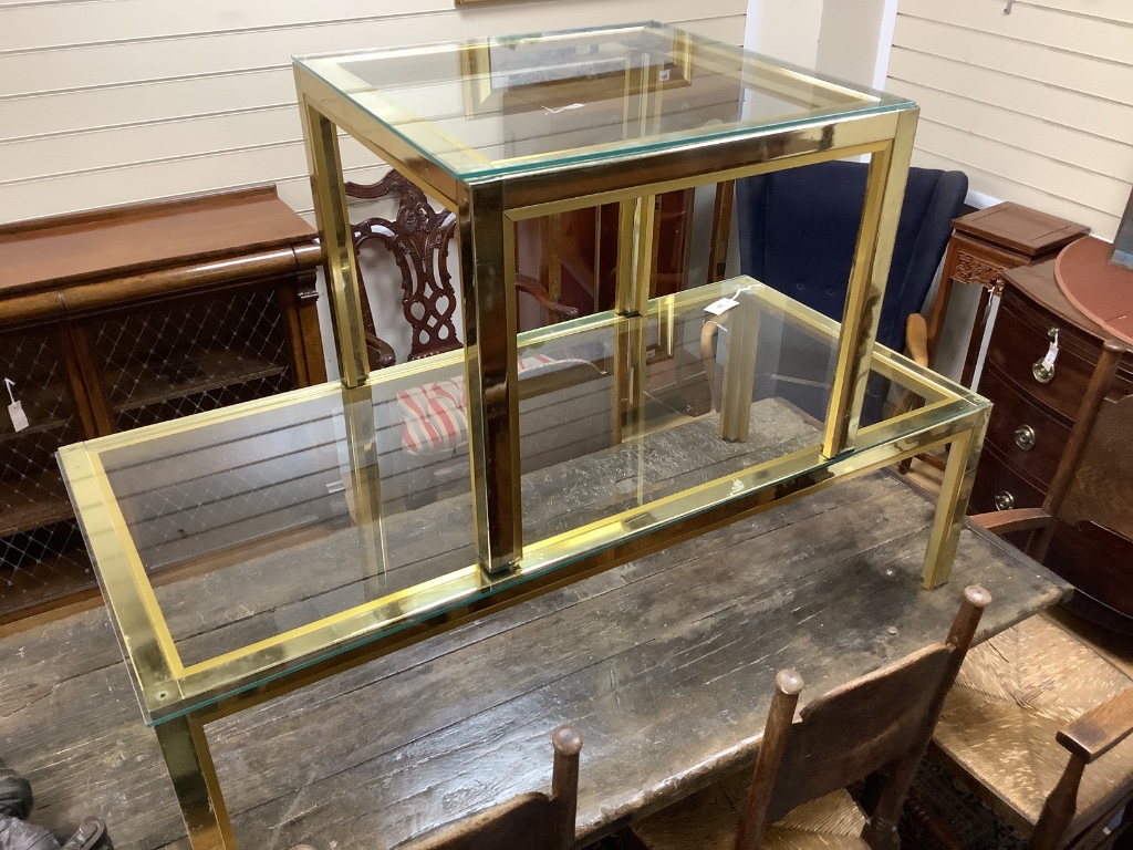 Two Italian Romeo Rega brass glass top low tables, circa 1970, larger 130cm, height 60cm